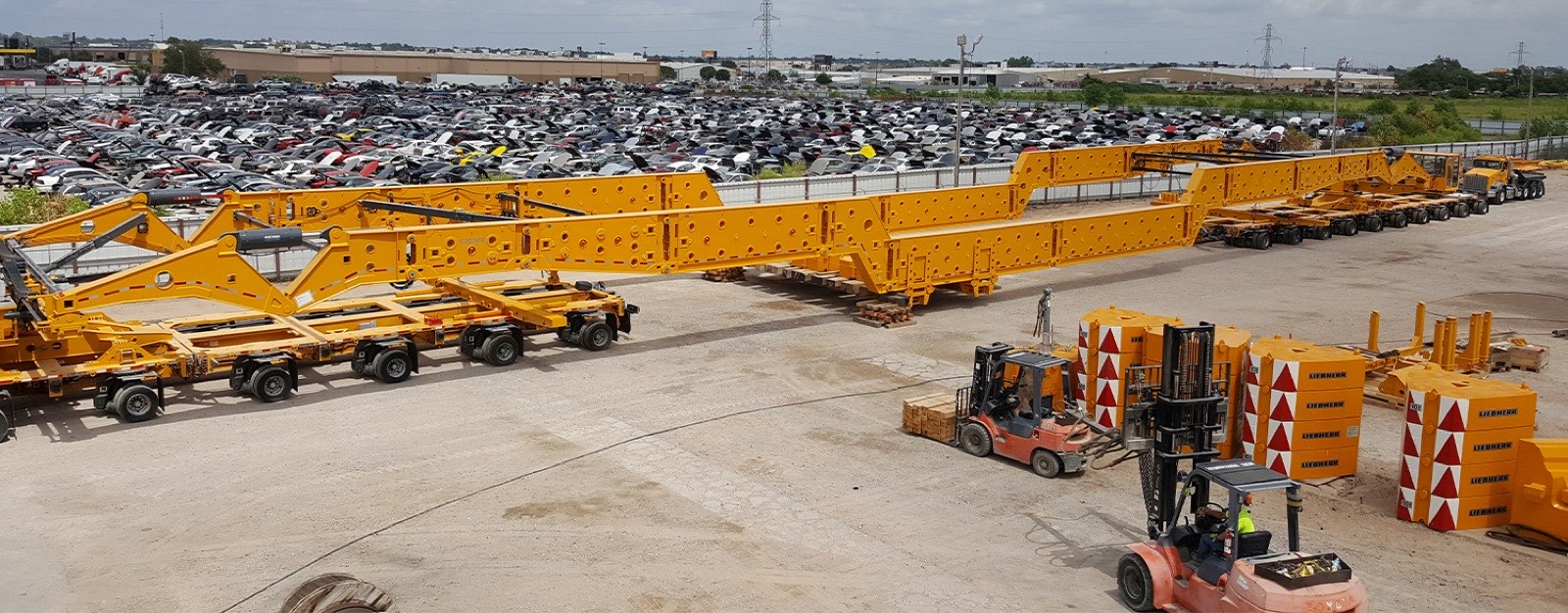 Girder frame transport system hauling a transformer