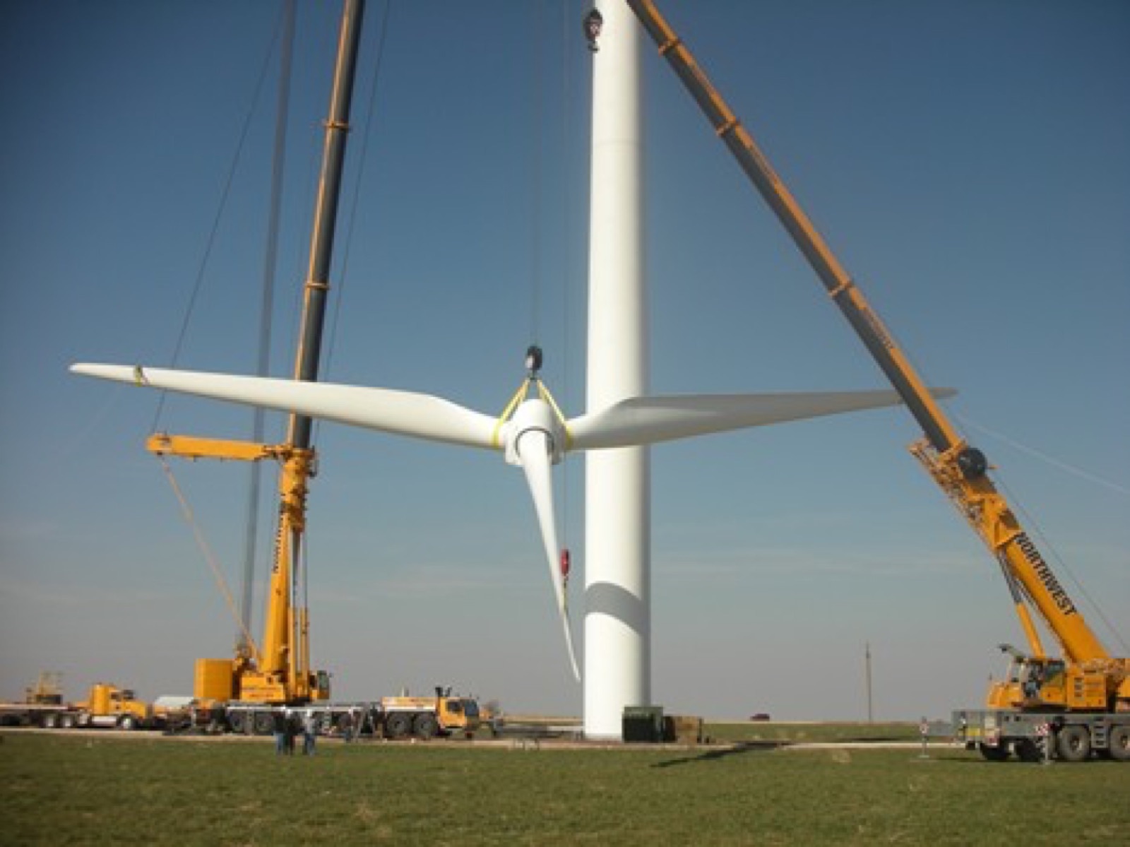 Compact crane working over a residence