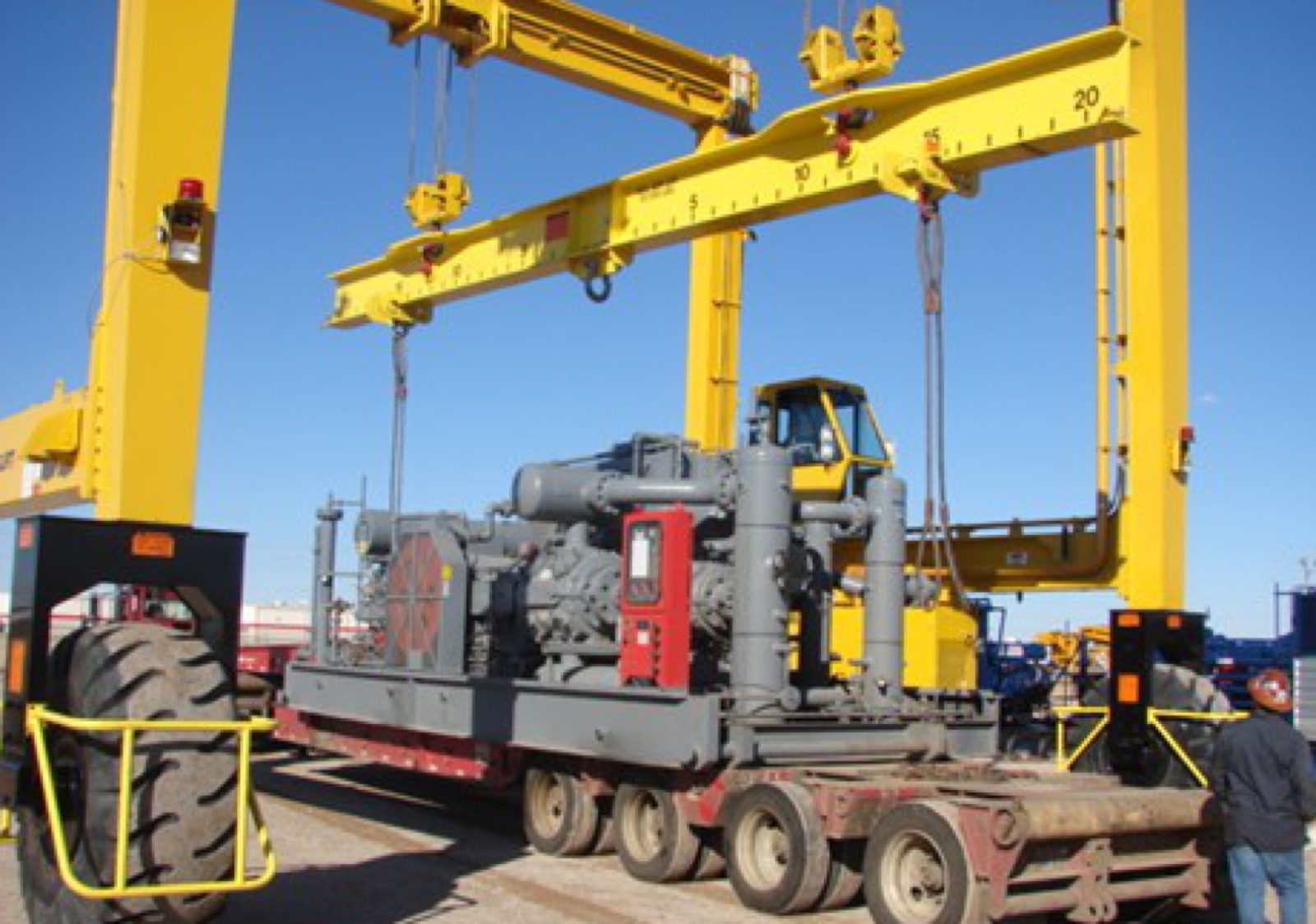 Northwest's gantry crane system loading a gas compressor in the Oklahoma City yard