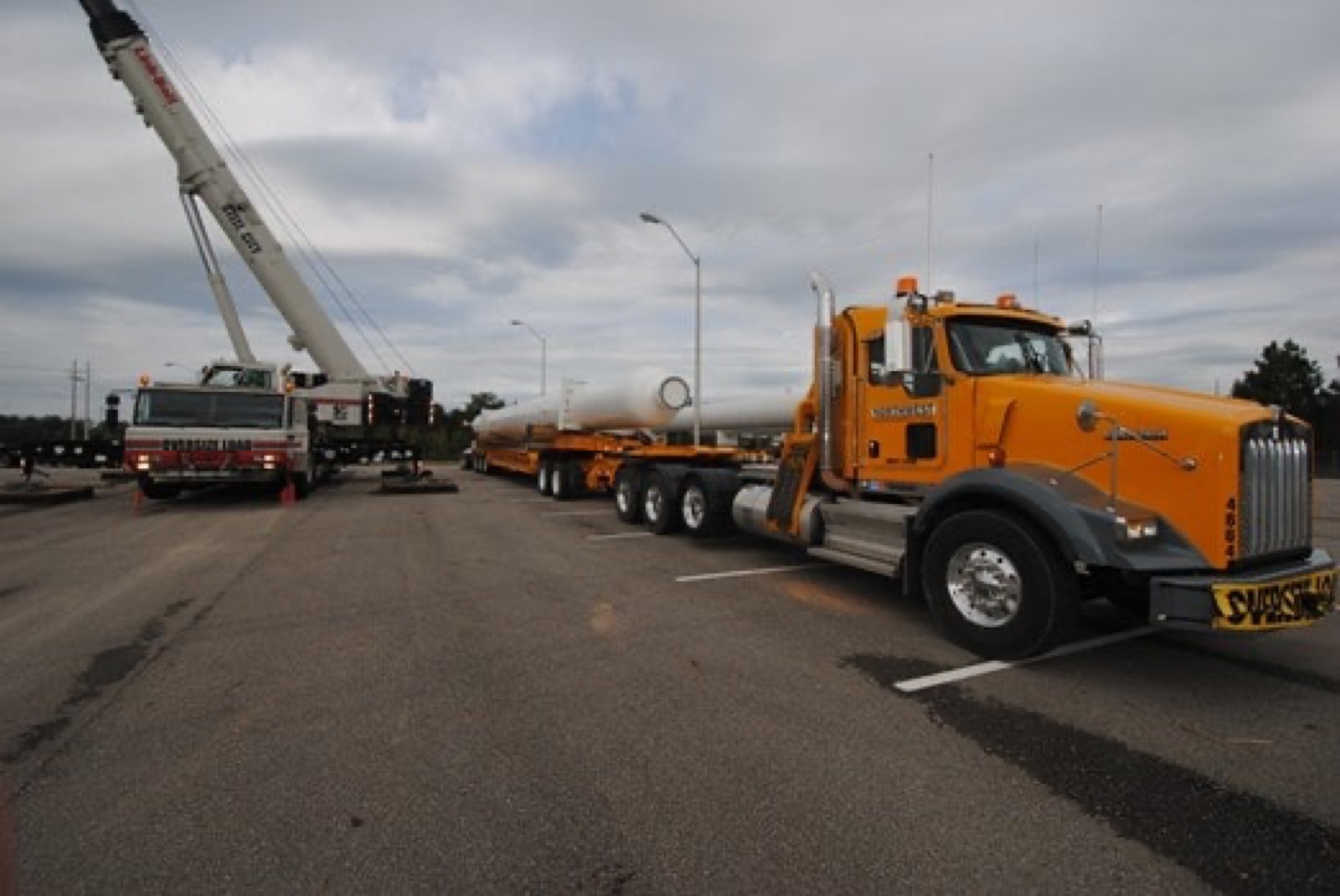 Northwest heavy haul tractor moving an 85-foot vessel for NASA's Stennis Space Center