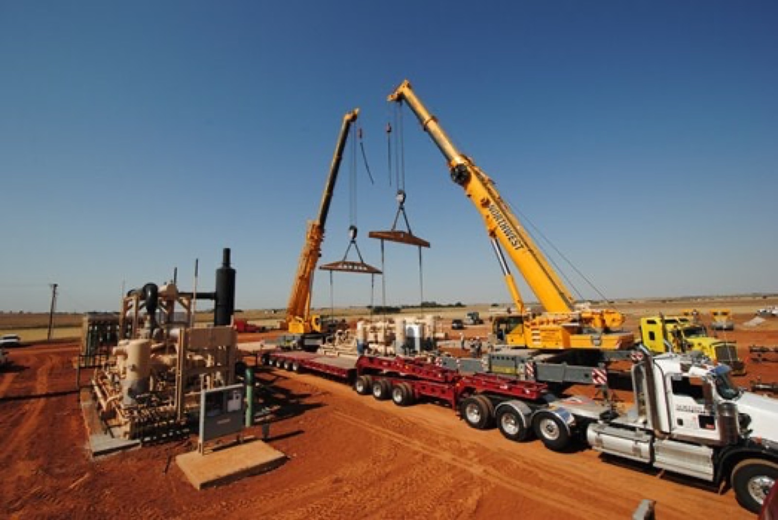 Northwest crew moving a drilling rig module by self-propelled transporter