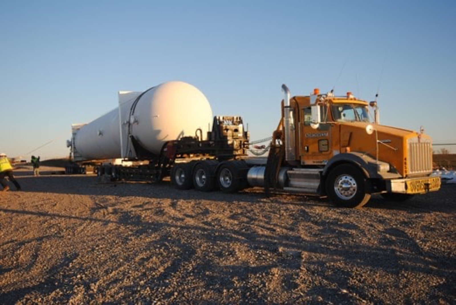 Northwest 13-axle rear-steerable trailer hauling a 92-foot vessel